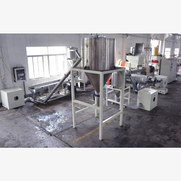 Internal refining double stage extrusion granulation hot cutting unit